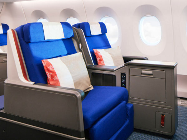 https://edelweiss.scene7.com/is/image/flyedelweiss/Edelweiss_A350_Business_Class_Seat_Sideview-4:figure-600w?ts=1746021048992&dpr=on,1