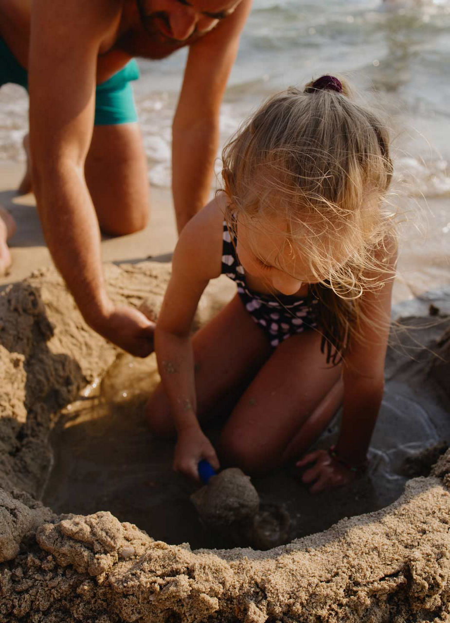 Kid playing in sand