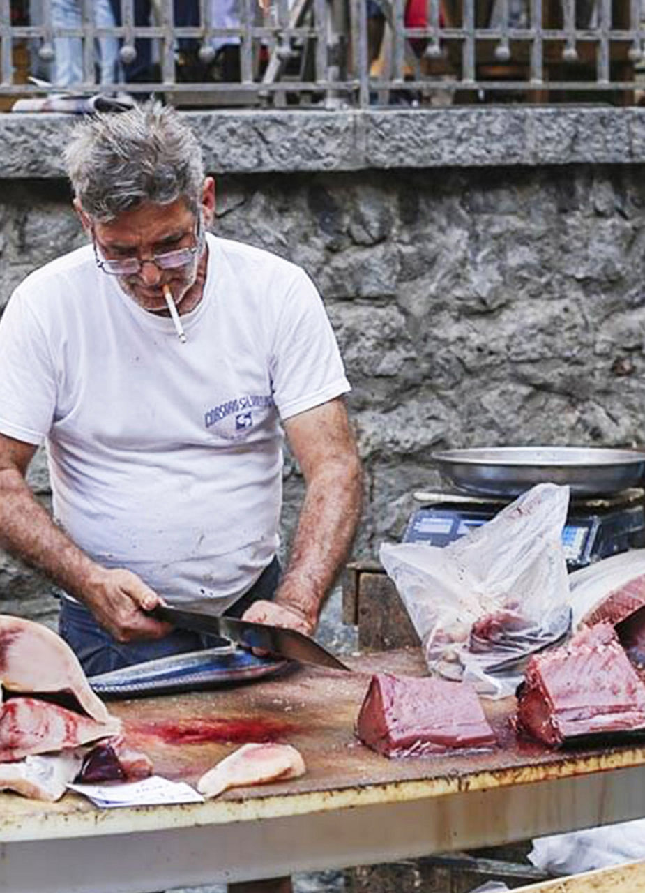 Fisherman Preparing his Catch