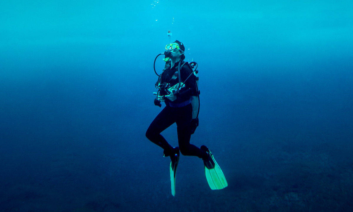 A sole diver in the water