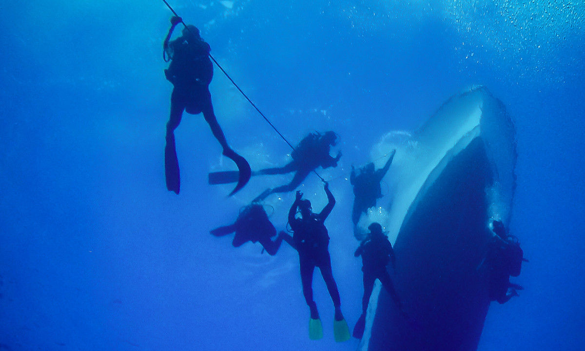 Underwater diver with a boat