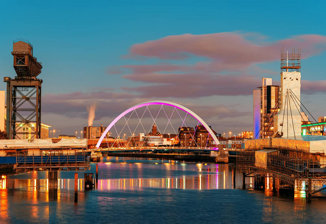 Modern bridge in Glasgow at dawn