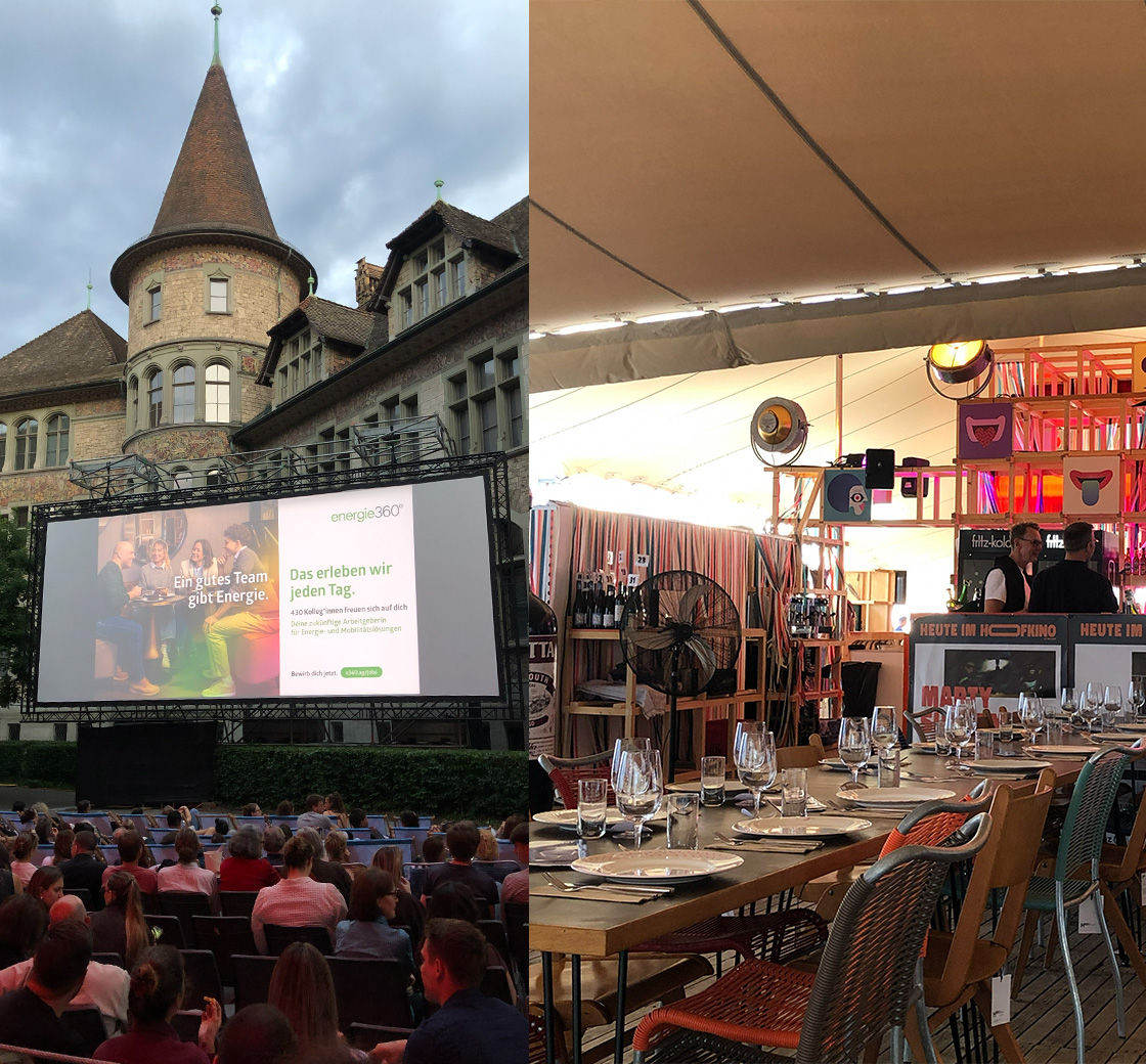 Openair Kino und gedeckter Tisch mit Bar im Hintergrund