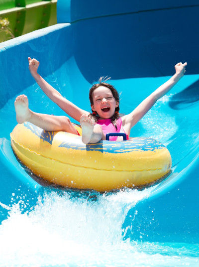 Girl enjoying the water slide