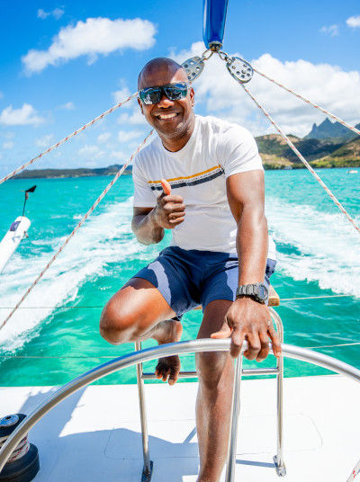 Skipper on board of a Catamaran