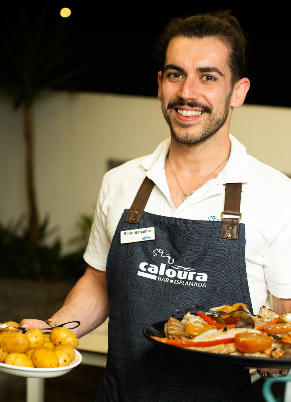 Guy serving fresh fish