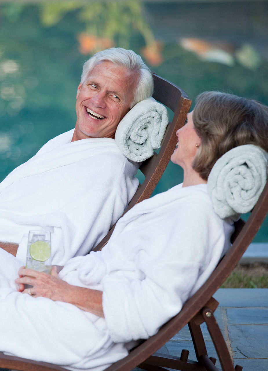 Couple relaxing on terrace