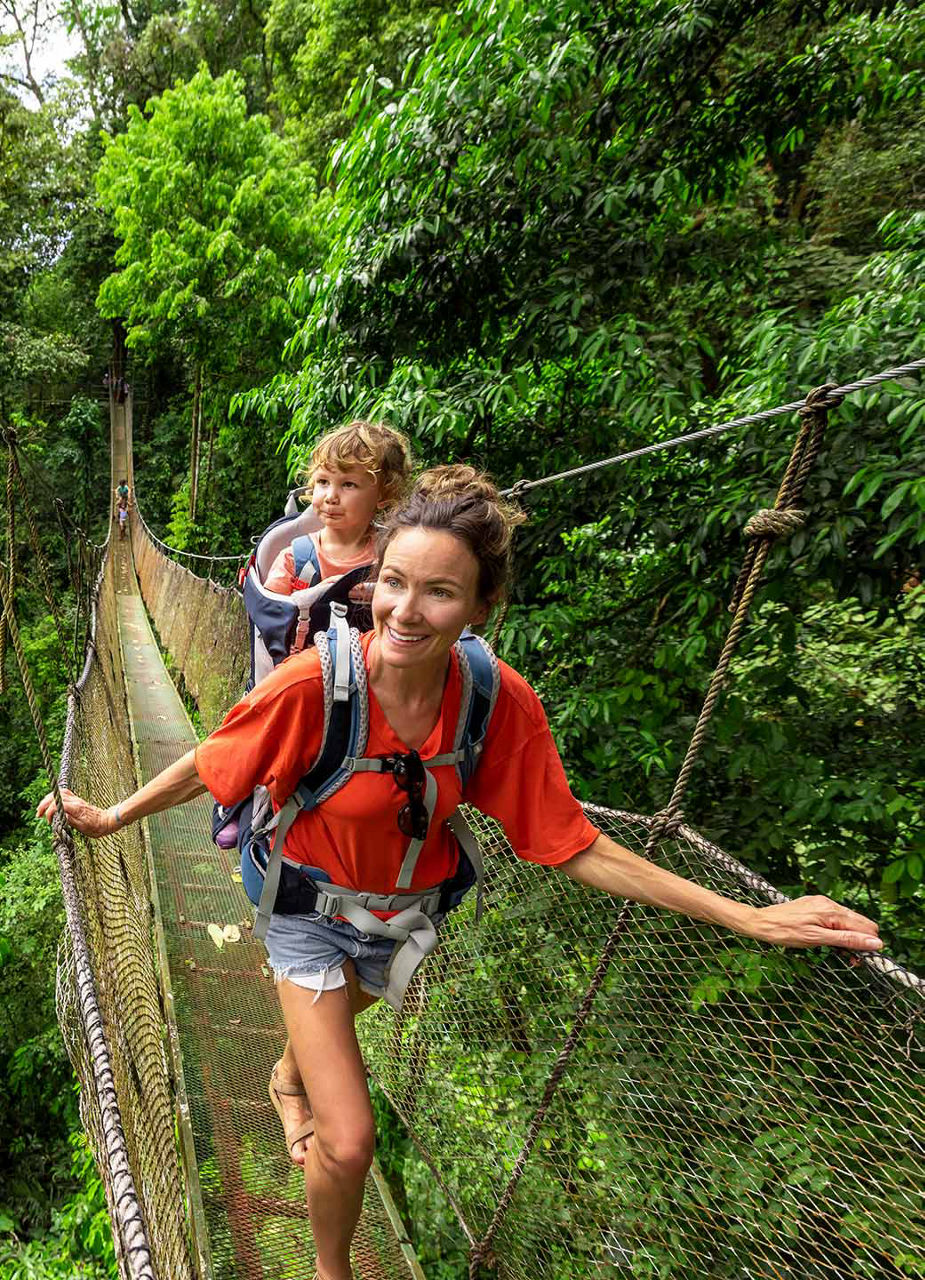 Mother hiking with girl