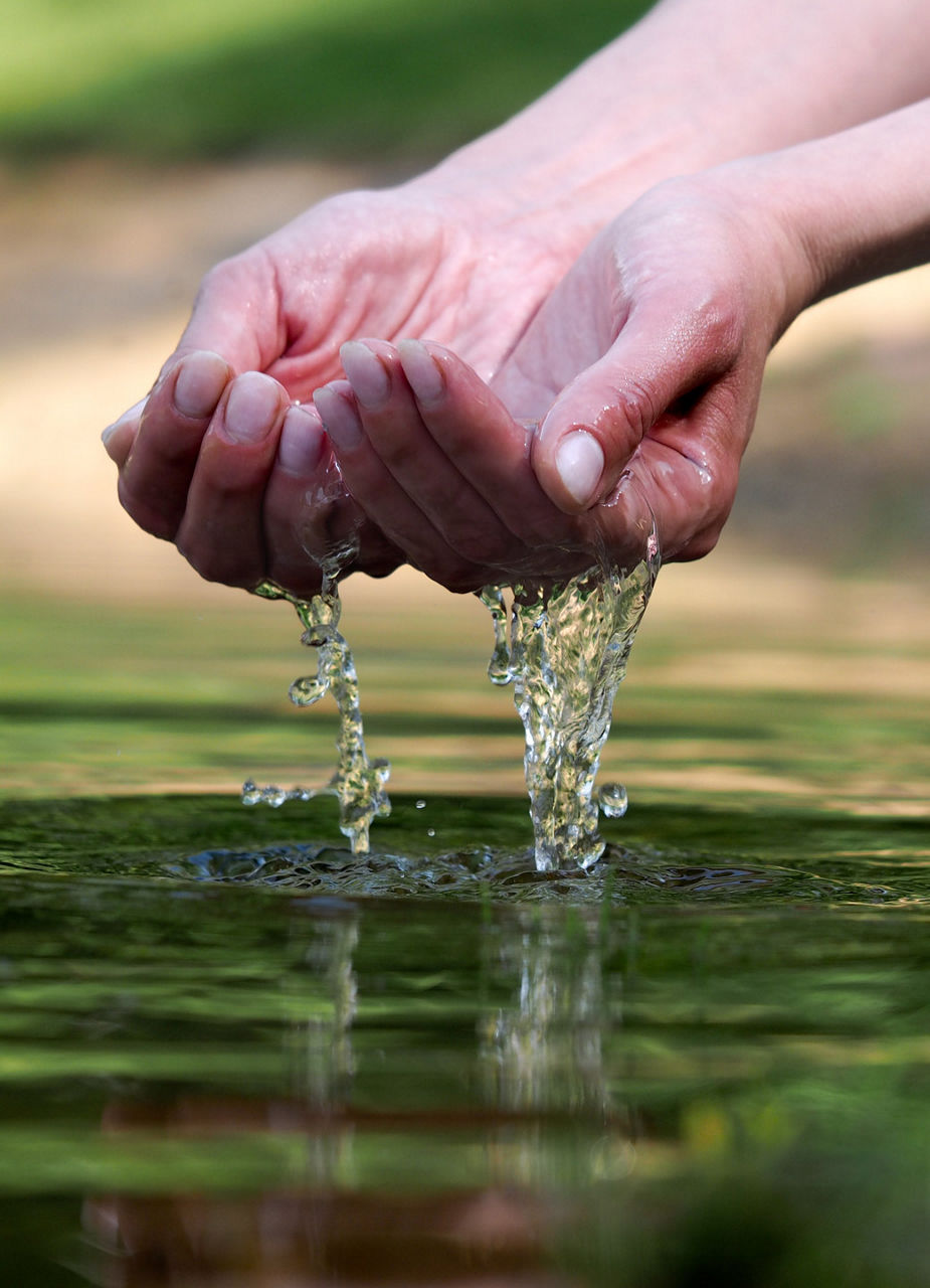 Hands in Hot Spring