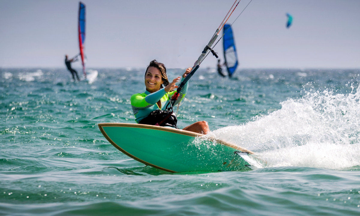 Woman kite surfing