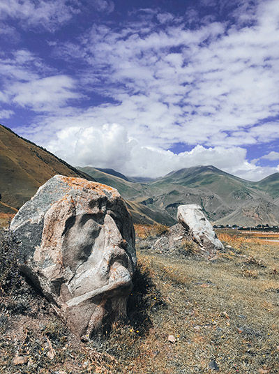 Sno village with historic stone heads