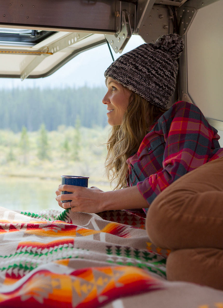 Woman enjoying break in van